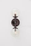 Applique double boule en verre et métal brun Polaris . Arteriors. Applique double boule en verre et métal brun Polaris . Arteriors.