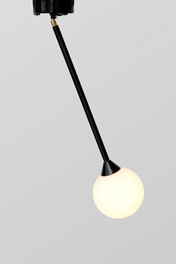 Suspension on black metal rod and white ball in opal glass. Atelier Areti. 