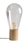 Lampe grosse ampoule en verre brun et pied en bois. Concept Verre. Lampe grosse ampoule en verre brun et pied en bois. Concept Verre.