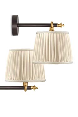 Joseph bronze antique wall lamp and ivory pleated silk lampshade. Jacques Garcia. 