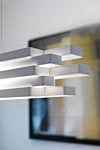 Suspension en aluminium blanc à rectangles superposés Escape - 60cm. Karboxx. Suspension en aluminium blanc à rectangles superposés Escape - 60cm. Karboxx.