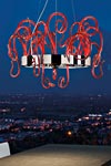 Suspension verre rouge en boucles Aspid. Leucos. Suspension verre rouge en boucles Aspid. Leucos.