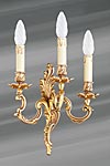 Applique bronze Louis XV vieil or trois bougeoirs. Lucien Gau. Applique bronze Louis XV vieil or trois bougeoirs. Lucien Gau.