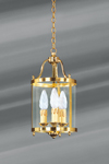 Applique de style classique en bronze doré poli entourée et surmontée de verre . Lucien Gau. Applique de style classique en bronze doré poli entourée et surmontée de verre . Lucien Gau.