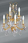 Applique de style Louis XV bronze doré et cristal cinq lumières. Lucien Gau. 