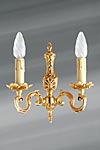 Applique en bronze Louis XV deux lumières. Lucien Gau. Applique en bronze Louis XV deux lumières. Lucien Gau.