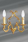 Applique Louis XV en bronze doré deux lumières. Lucien Gau. Applique Louis XV en bronze doré deux lumières. Lucien Gau.