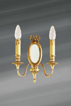Applique miroir à deux lumières, style Louis XVI en bronze doré. Lucien Gau. Applique miroir à deux lumières, style Louis XVI en bronze doré. Lucien Gau.