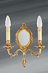 Applique miroir Louis XV en bronze vieil or double bougeoir. Lucien Gau. Applique miroir Louis XV en bronze vieil or double bougeoir. Lucien Gau.