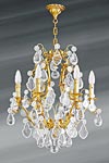 Golden Louis XV chandelier with bohemian crystal six lights. Lucien Gau. Golden Louis XV chandelier with bohemian crystal six lights. Lucien Gau.