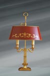 Lampe de style Directoire, en bronze massif doré, décor épuré. Lucien Gau. 
