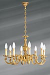 Lustre bronze Louis XV huit lumières. Lucien Gau. Lustre bronze Louis XV huit lumières. Lucien Gau.
