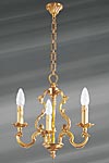 Lustre bronze Louis XV trois lumières doré. Lucien Gau. Lustre bronze Louis XV trois lumières doré. Lucien Gau.