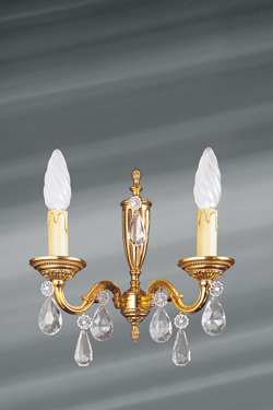 Wall lamp in gilded bronze with crystal pendants, Louis XVI style, two lights. Lucien Gau. 