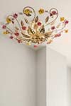 Leather-effect, gold and copper ceiling light with ceramic flowers. Masiero. Leather-effect, gold and copper ceiling light with ceramic flowers. Masiero.