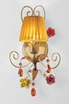 Leather-effect, gold and copper wall light with golden-yellow shade and crystal drops. Masiero. Leather-effect, gold and copper wall light with golden-yellow shade and crystal drops. Masiero.