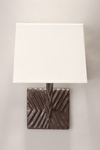Patined black bronze wall lamp, geometric pattern Togo. Objet insolite. Patined black bronze wall lamp, geometric pattern Togo. Objet insolite.