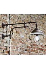 Wall lamp with double arm in patinated brass. Aldo Bernardi. Wall lamp with double arm in patinated brass. Aldo Bernardi.