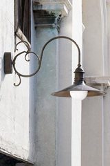 Large outdoor wall lamp with scrolled arms. Aldo Bernardi. Large outdoor wall lamp with scrolled arms. Aldo Bernardi.