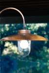 Outdoor wall light in patinated brass and transparent glass. Aldo Bernardi. 