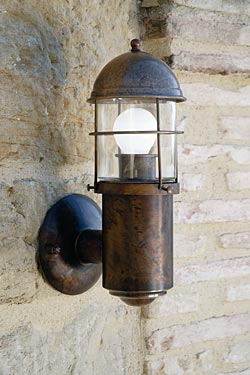 Outdoor wall lamp with lighthouse lantern, grid and cylinder. Aldo Bernardi. 