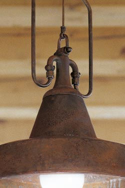 Pendant cone and tubes in aged brass. Aldo Bernardi. 