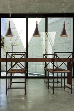 Dark brown cone waxed concrete pendant lamp Funnel. Aldo Bernardi. 