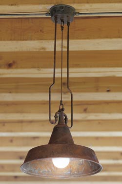 Pendant cone and tubes in aged brass. Aldo Bernardi. 