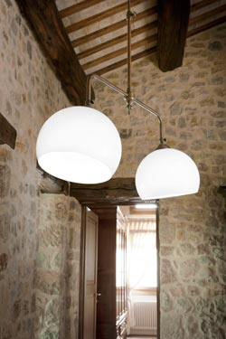 Double pendant lamp in aged brass and shiny white opal glass Farmacia. Aldo Bernardi. 