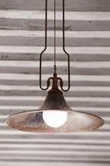 Large flared pendant lamp in aged brass. Aldo Bernardi. 