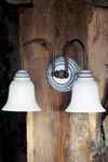 Wall lamp decorated white porcelain and aged patinated brass tubes. Aldo Bernardi. 