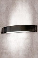 Black patinated steel wall lamp in band shape. Aldo Bernardi. Black patinated steel wall lamp in band shape. Aldo Bernardi.