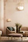 Applique ronde en onyx et laiton antique Savion. Arteriors. 