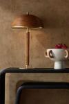 Lampe de table en rotin et laiton antique Annette. Arteriors.