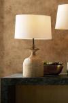 Grande lampe de table en travertin et métal bronze Bridgeport. Arteriors. 