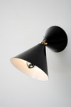 Black wall lamp with adjustable cone white inside. Atelier Areti. 