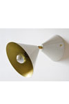 White lacquered cone wall light with golden interior. Atelier Areti. 