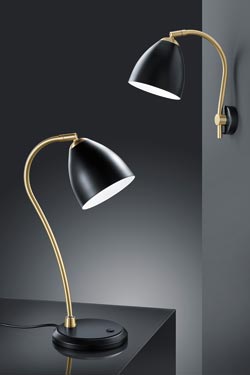 Wall lamp in black metal and satin brass. Baulmann Leuchten. 