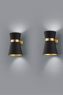 Black and golden wall lamp. Baulmann Leuchten. 