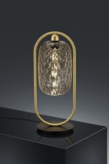 Lampe de table Design doré et verre transparent