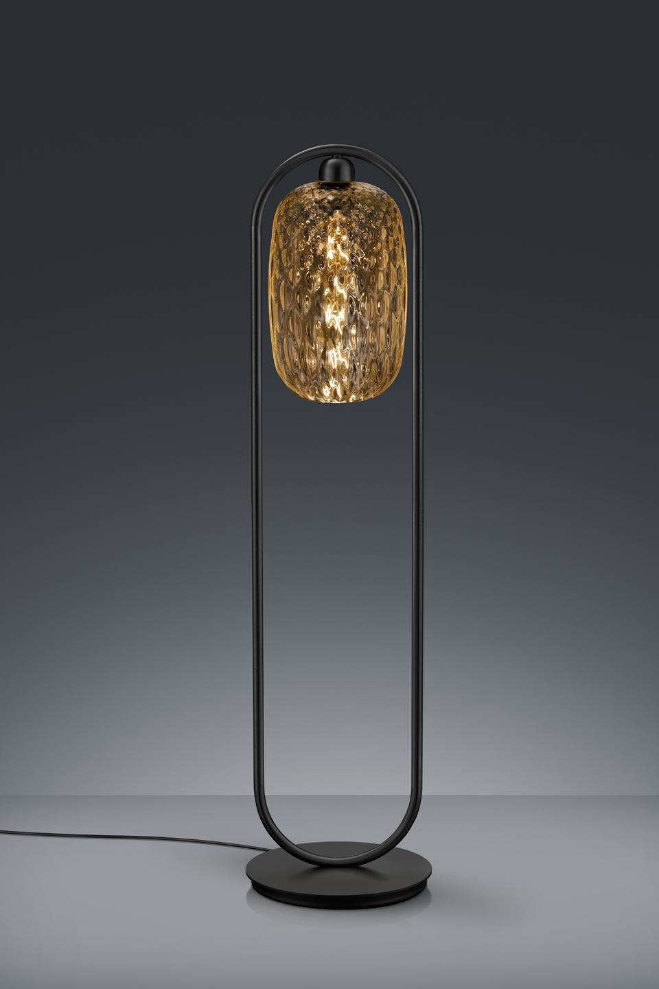 Petit lampadaire Design en verre ambré et métal noir. Baulmann Leuchten. 