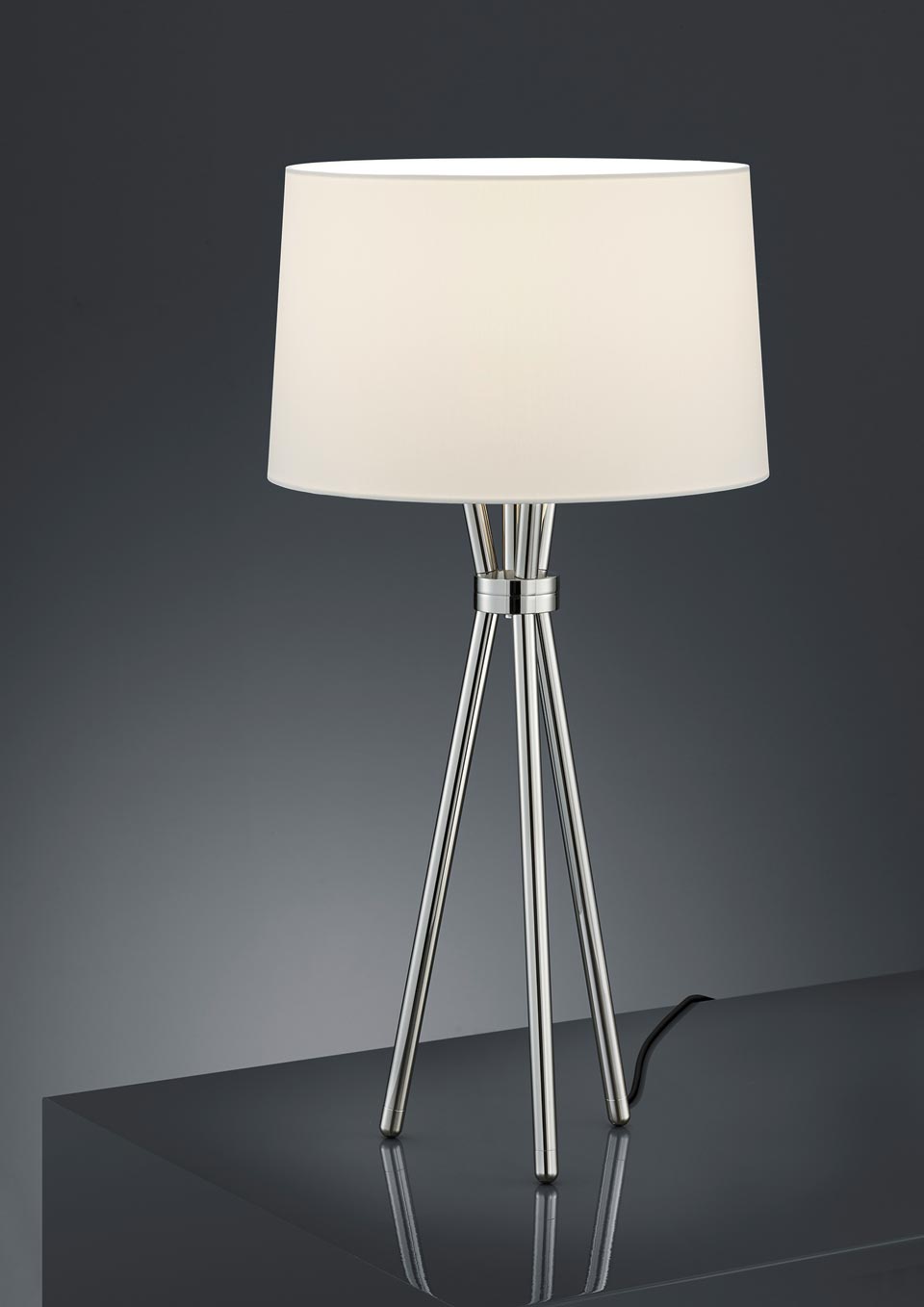 Tripod table lamp in polished nickel. Baulmann Leuchten. 