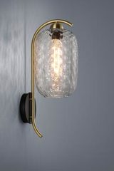 Golden and design wall lamp with carved glass