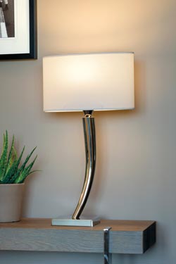 Bright nickel lamp with curved foot L150. Casadisagne. 