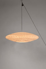 Zen round paper rise and fall with pulley and ivory cable. Céline Wright. Zen round paper rise and fall with pulley and ivory cable. Céline Wright.
