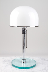 Table lamp in glass and chromed metal. Contract&More. Table lamp in glass and chromed metal. Contract&More.