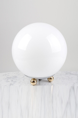White glass ball table lamp on 3 small ball feet. Contract&More. 
