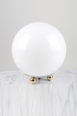 White glass ball table lamp on 3 small ball feet. Contract&More. White glass ball table lamp on 3 small ball feet. Contract&More.