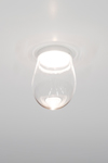 Design spot in transparent glass and white metal Dropz. Dark. 