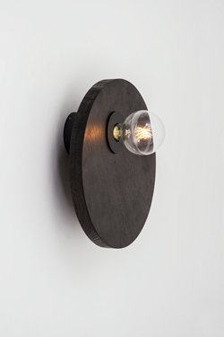 Large wall lamp in intense black wood. Dark. 